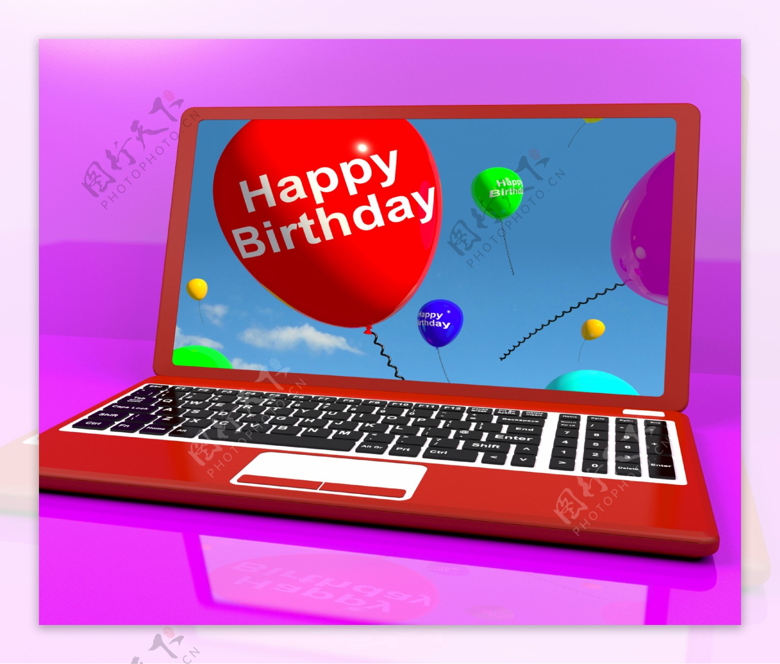 生日快乐的气球在笔记本电脑的屏幕上显示的电子贺卡