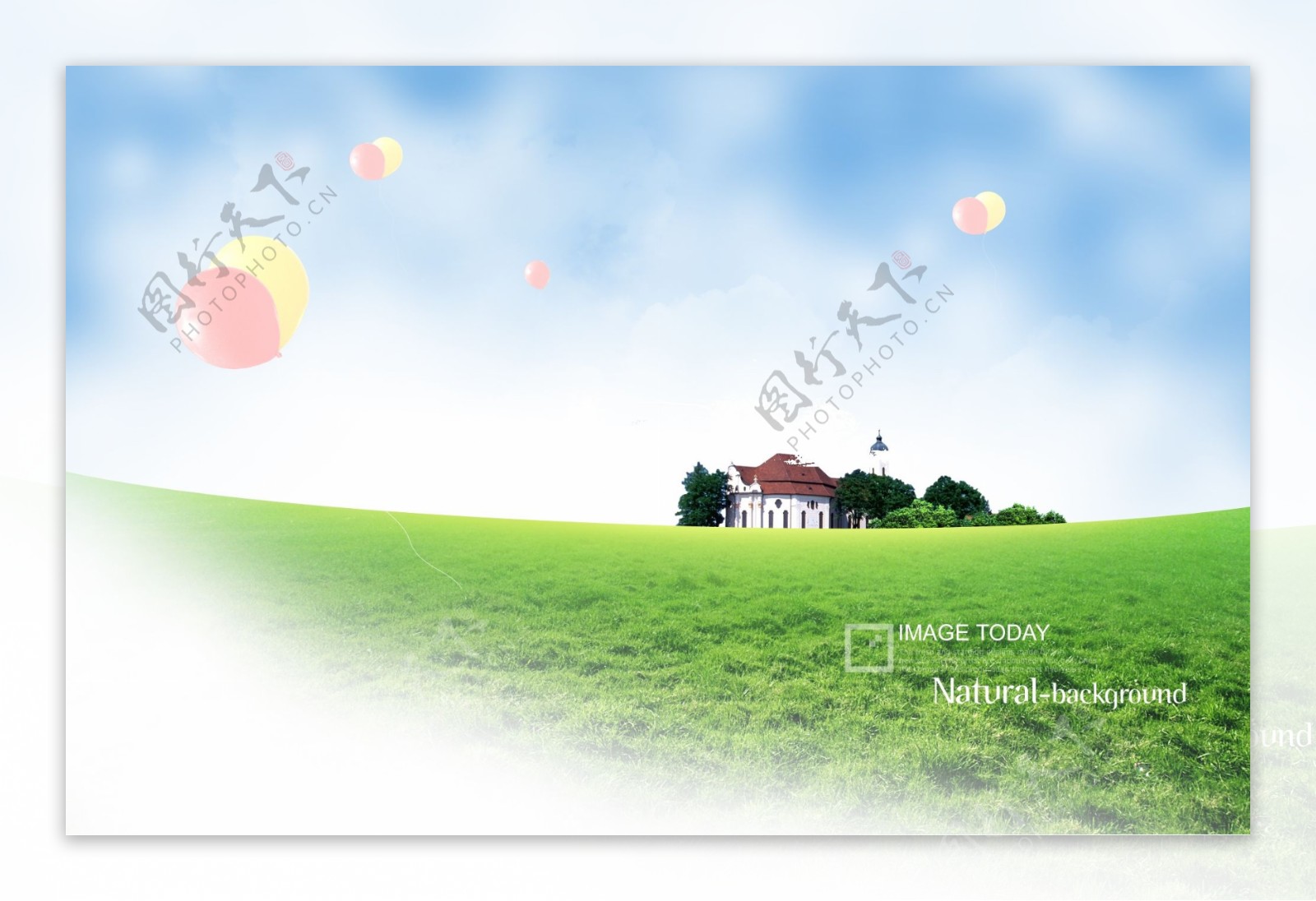 草地上的房屋和气球
