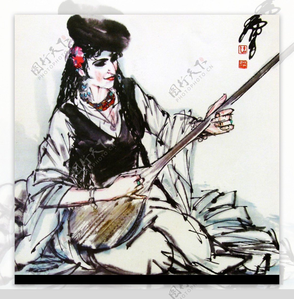 弹琴的维吾尔族少女图片