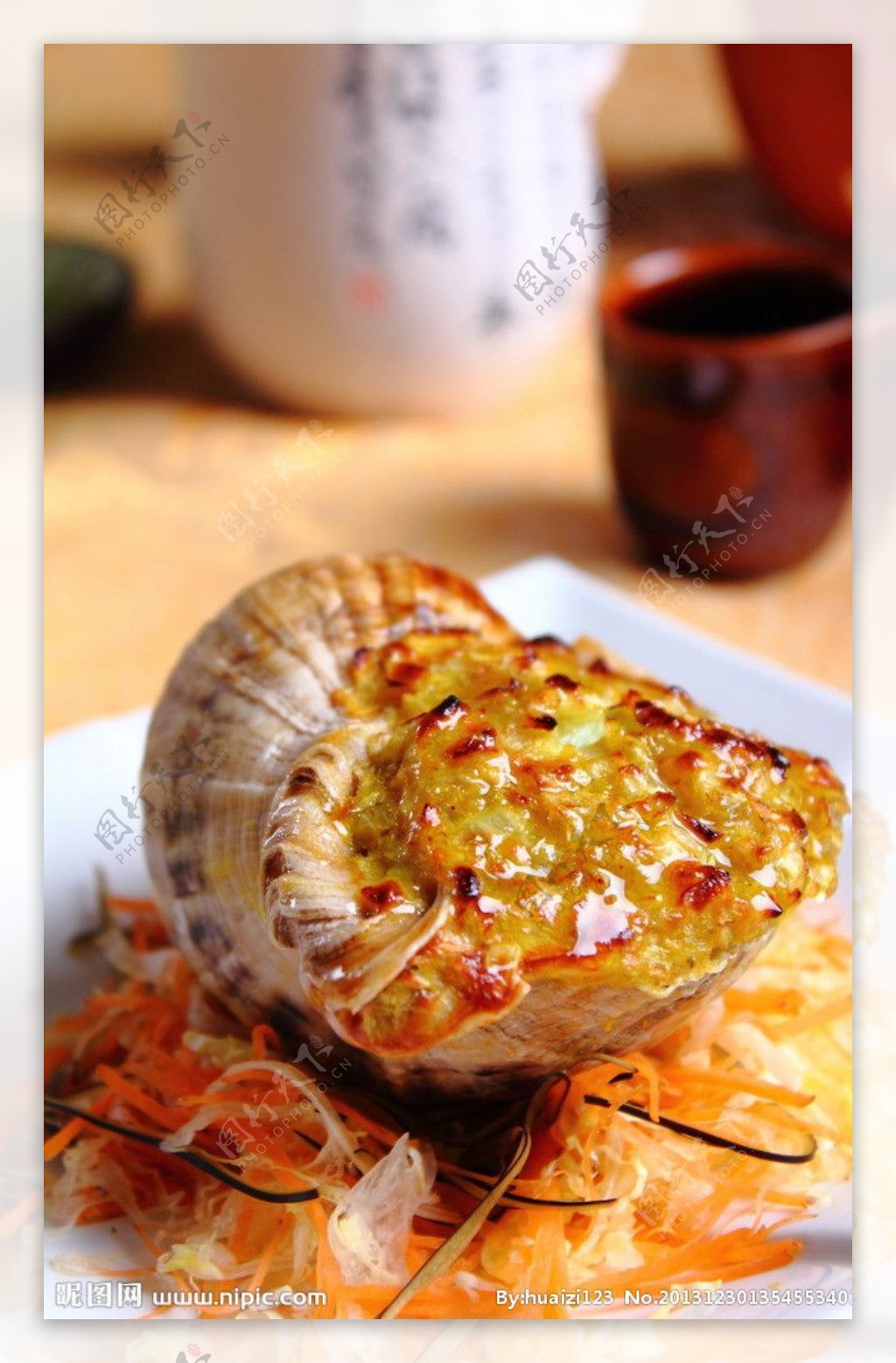 格兰鲜蟹肉焗酿响螺图片