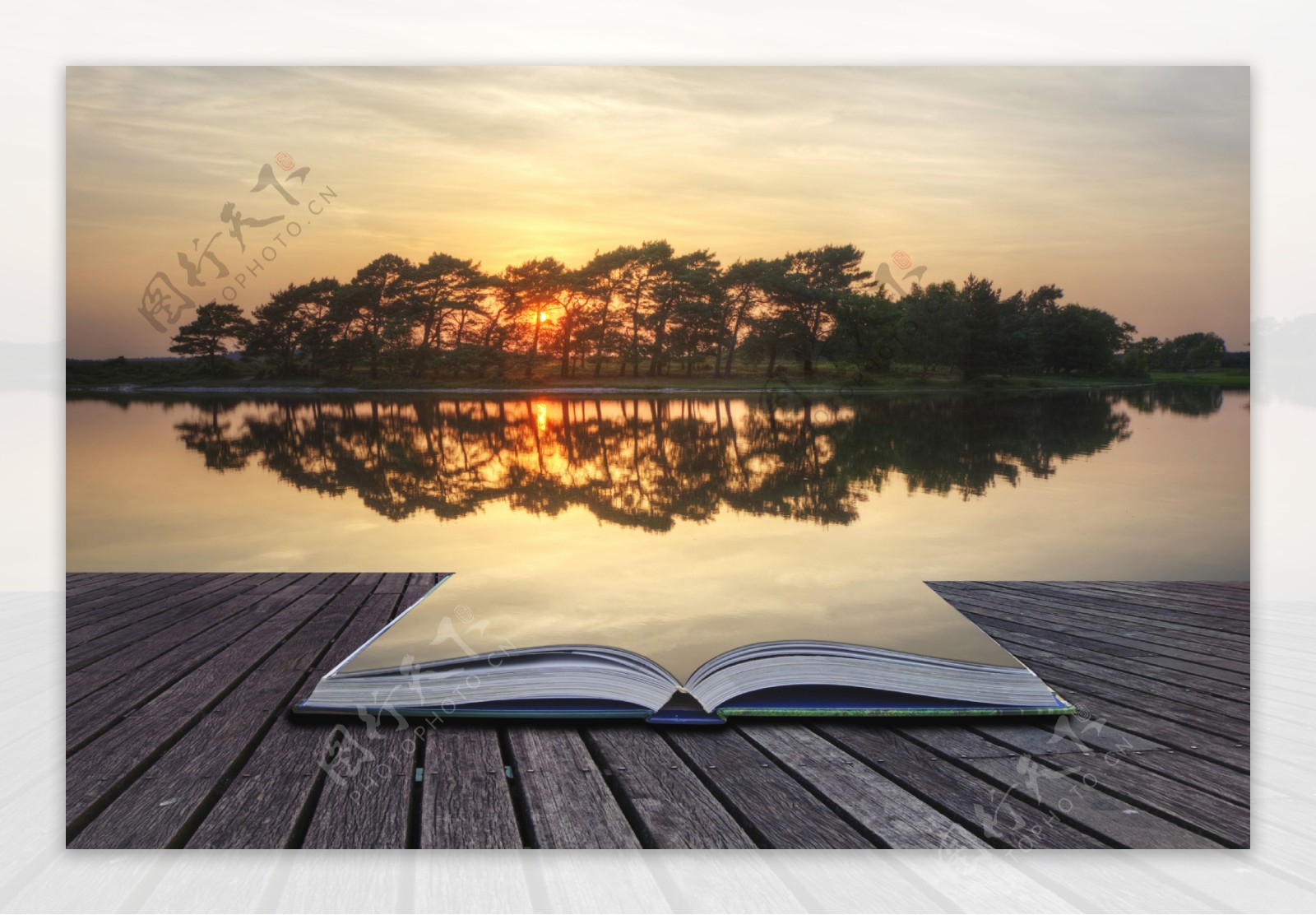 夕阳湖水风景与书本图片
