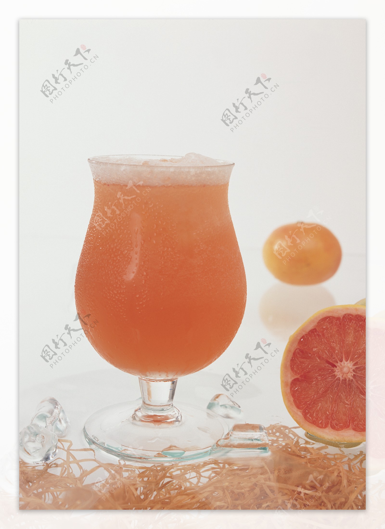切开的橙子与果汁特写图片图片
