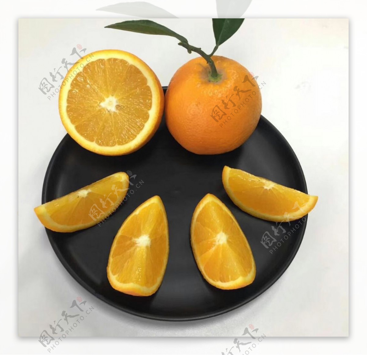 金堂脐橙剥开的脐橙脐橙果盘